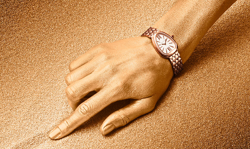 Serpenti Seduttori 18 kt rose gold watch with diamonds on the case and silver opaline dial.
