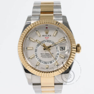 Rolex Sky-Dweller 326933 with stainless steel and yellow gold case, white dial, and fluted bezel