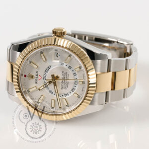 Rolex Sky-Dweller 326933 with stainless steel and yellow gold case, white dial, and fluted bezel