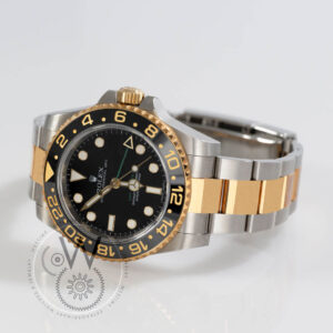 Rolex GMT-Master II Ref. M116713LN-0001 with black dial and two-tone bracelet