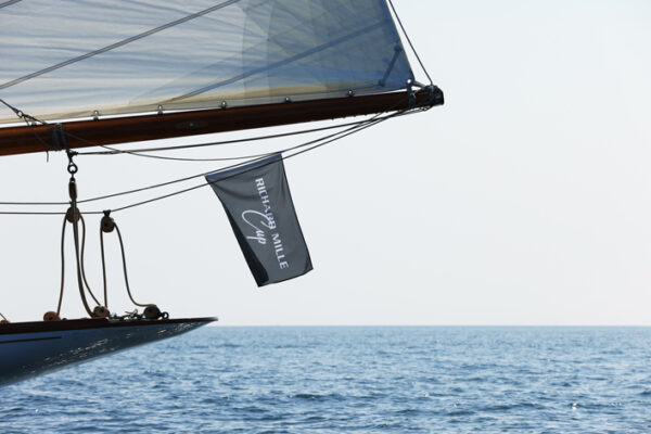 Richard Mille Cup Sail boat racing boat with flag