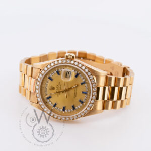 Rolex with a Yellow Gold Case, Yellow Gold Dial featuring Diamond Markers and Ring, 36mm, and Yellow Gold Strap (Model 18048) Side
