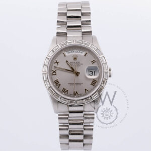 Rolex Day-Date with a Platinum Case, Silver Dial featuring Diamond Markers, 36mm, and Platinum Strap (Model 18366)
