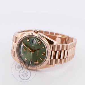 Rolex Day-Date with a Red Gold Case, Green Dial, 40mm, and Red Gold Strap (Model 228235) Side