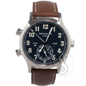 Patek Philippe 5524G-001 Calatrava Pilot Travel Time with a 42mm white gold case, blue dial, and vintage brown calfskin strap.