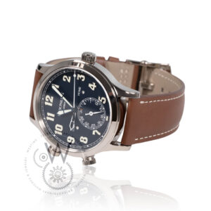 Patek Philippe 5524G-001 Calatrava Pilot Travel Time with a 42mm white gold case, blue dial, and vintage brown calfskin strap.