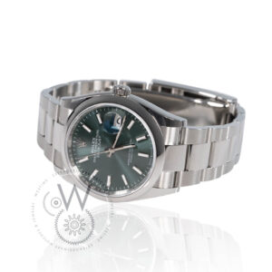 Rolex Datejust 36 126200 with a 36mm stainless steel case, green dial, and an Oyster bracelet.