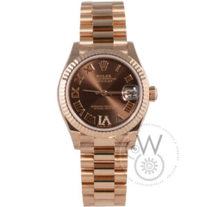 Rolex Lady-Datejust 278275, 31mm rose gold case with brown dial and rose gold fluted bezel.