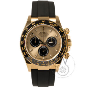 Rolex Daytona 126518LN with a yellow gold case, champagne dial, and black Cerachrom bezel on an Oysterflex bracelet.