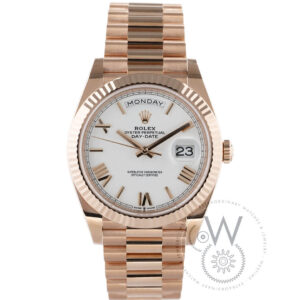 Rolex Day-Date 40mm Yellow Gold Watch Ref. 228235 with White Roman Dial and Fluted Bezel