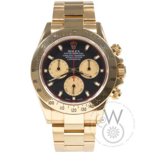 Rolex Daytona Ref. 116528 in yellow gold with black dial and champagne subdials on Oyster bracelet