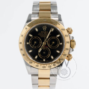 Rolex Daytona Ref. 116523 with black dial, yellow gold bezel, and two-tone steel and gold case