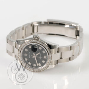 Rolex Datejust 26 Ref. 179384 with black dial, diamond bezel, and stainless steel case