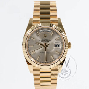Rolex Day-Date 40 Ref. 228238 in 18k yellow gold with silver dial and fluted bezel